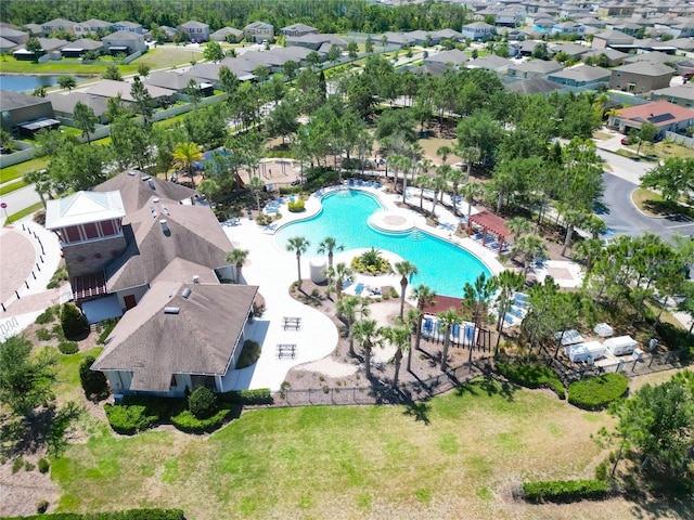 birds eye view of property with a residential view