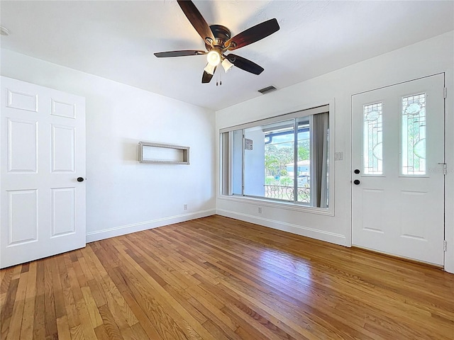 6920 Bougainvilla Ave S, Saint Petersburg, FL 33707 - foyer entrance with light wood-style flooring, ceiling fan, baseboards, and visible vents