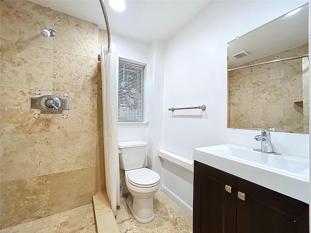 6920 Bougainvilla Ave S, Saint Petersburg, FL 33707 - full bathroom featuring a tile shower, tile patterned floors, vanity, and toilet