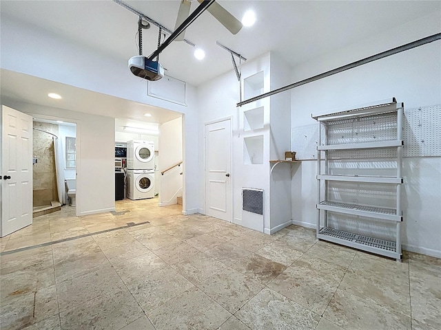 6920 Bougainvilla Ave S, Saint Petersburg, FL 33707 - garage featuring stacked washer and dryer, baseboards, recessed lighting, and a garage door opener