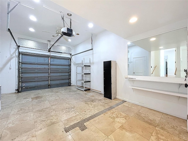 6920 Bougainvilla Ave S, Saint Petersburg, FL 33707 - garage with baseboards, recessed lighting, and a garage door opener