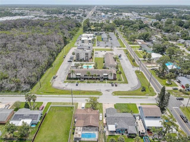 8440 Old Post Rd Unit 104, Port Richey, FL 34668 - aerial perspective of suburban area with a pool area