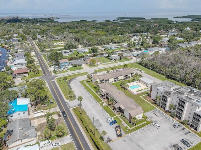 8440 Old Post Rd Unit 104, Port Richey, FL 34668 - bird's eye view of a pool area and a large body of water