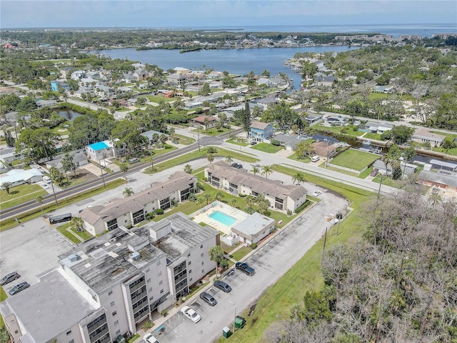 8440 Old Post Rd Unit 104, Port Richey, FL 34668 - drone / aerial view of a nearby body of water and a pool