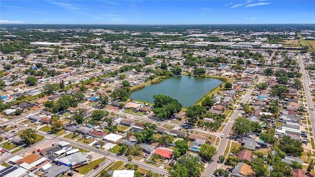 bird's eye view with a water view and a residential view