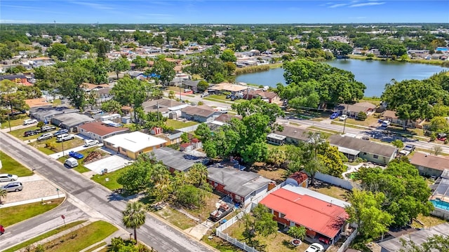 bird's eye view featuring a water view and a residential view