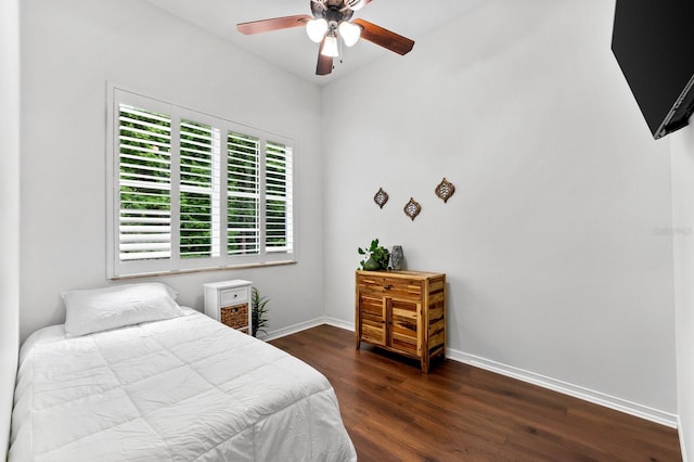 15045 Wind Whisper Dr, Odessa, FL 33556 - bedroom with wood finished floors, baseboards, and a ceiling fan