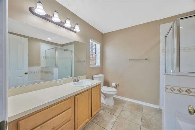 full bathroom with a shower stall, vanity, toilet, tile patterned floors, and baseboards