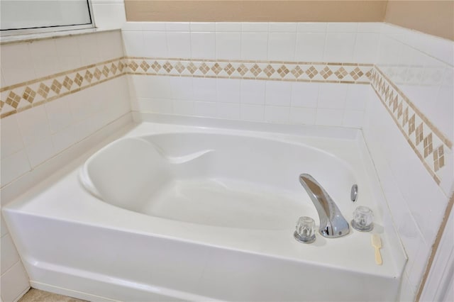 full bathroom with a garden tub