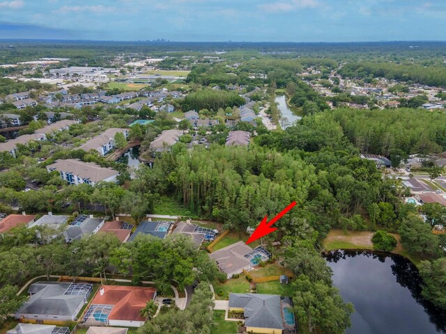 3728 Cypress Meadows Rd, Tampa, FL 33624 - aerial overview of property's location featuring a large body of water and nearby suburban area