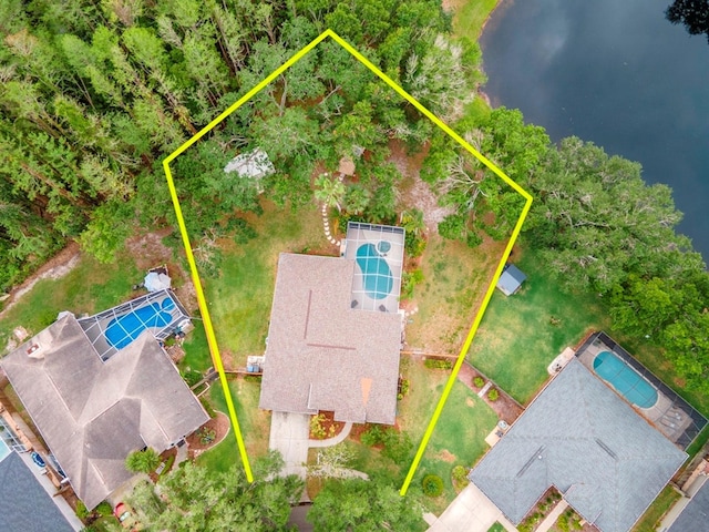 3728 Cypress Meadows Rd, Tampa, FL 33624 - aerial view of property and surrounding area featuring property boundaries highlighted and a large body of water