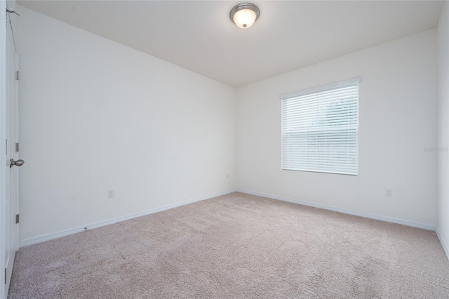 3844 Silverlake Way, Wesley Chapel, FL 33544 - carpeted spare room with baseboards