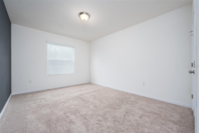 3844 Silverlake Way, Wesley Chapel, FL 33544 - carpeted spare room featuring baseboards