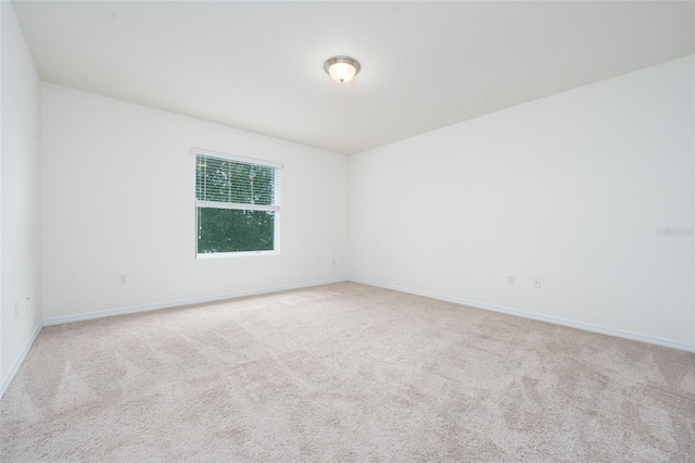 3844 Silverlake Way, Wesley Chapel, FL 33544 - spare room featuring carpet and baseboards