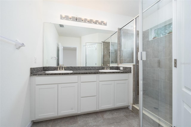 3844 Silverlake Way, Wesley Chapel, FL 33544 - bathroom with a shower stall and double vanity