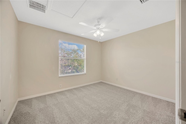 unfurnished room featuring visible vents, baseboards, and carpet floors