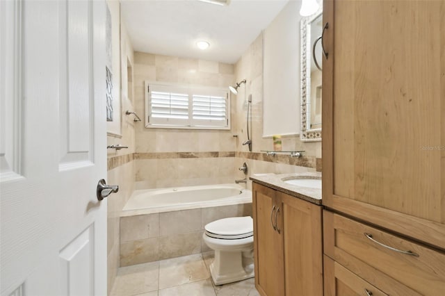 full bath with toilet, tiled shower / bath, tile patterned floors, and vanity