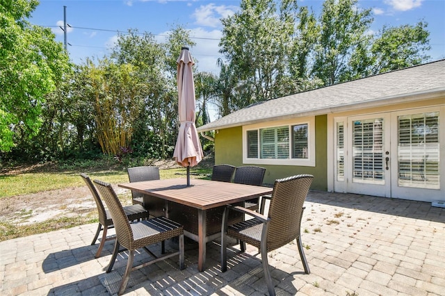 view of patio with french doors and outdoor dining area