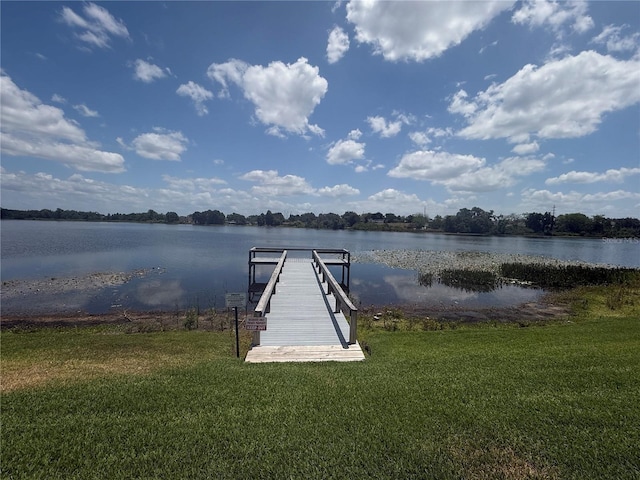 1550 11th St NE Unit G8, Winter Haven, FL 33881 - dock area featuring a water view and a lawn