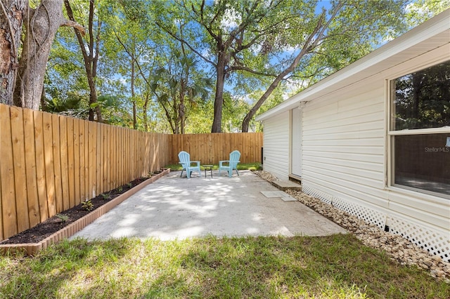 view of patio with a fenced backyard