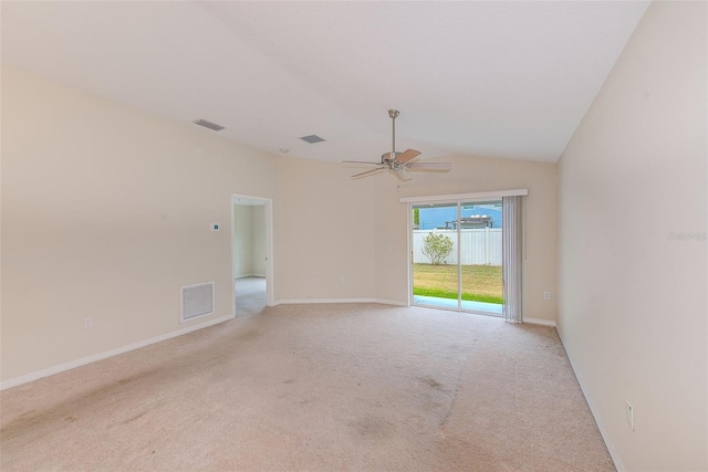 15410 Quail Woods Pl, Ruskin, FL 33573 - spare room with visible vents, a ceiling fan, carpet, and lofted ceiling