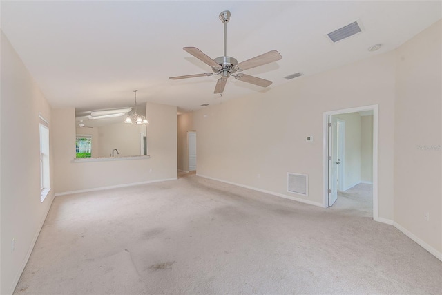 15410 Quail Woods Pl, Ruskin, FL 33573 - unfurnished living room with carpet flooring, visible vents, and ceiling fan