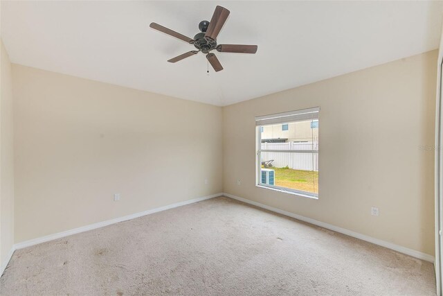 15410 Quail Woods Pl, Ruskin, FL 33573 - unfurnished room featuring baseboards, a ceiling fan, and carpet floors