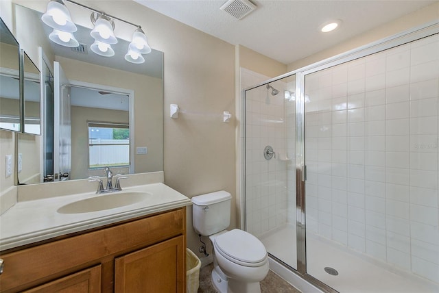 15410 Quail Woods Pl, Ruskin, FL 33573 - full bath with visible vents, toilet, a shower stall, and vanity