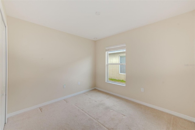15410 Quail Woods Pl, Ruskin, FL 33573 - unfurnished room with light carpet and baseboards
