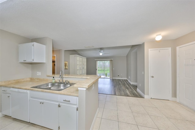 9481 Highland Oak Dr Unit 1206, Tampa, FL 33647 - kitchen featuring white dishwasher, a ceiling fan, light tile patterned floors, a peninsula, and open floor plan
