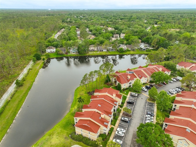 9481 Highland Oak Dr Unit 1206, Tampa, FL 33647 - drone / aerial view of a forest and a nearby body of water