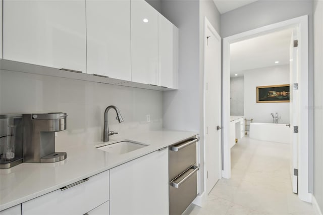 90 Martinique Ave, Tampa, FL 33606 - interior space with recessed lighting, marble finish floor, baseboards, and a sink