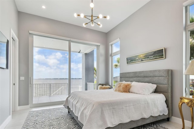 90 Martinique Ave, Tampa, FL 33606 - bedroom with baseboards, a chandelier, and access to exterior