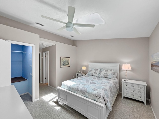 7508 Hollowell Dr, Tampa, FL 33615 - bedroom with light colored carpet, baseboards, and visible vents