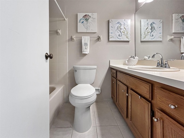 7508 Hollowell Dr, Tampa, FL 33615 - bathroom featuring tile patterned floors, vanity, bathtub / shower combination, and toilet