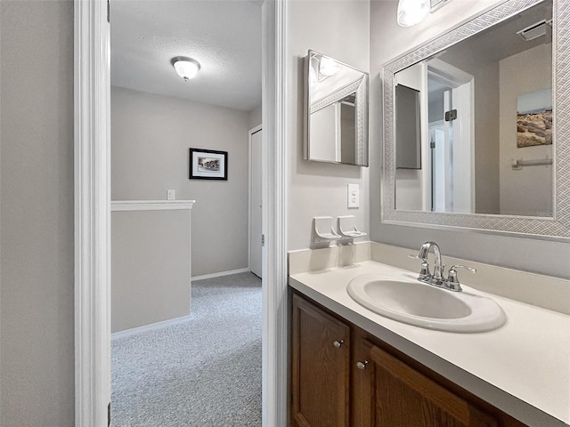 7508 Hollowell Dr, Tampa, FL 33615 - bathroom featuring vanity, baseboards, and visible vents