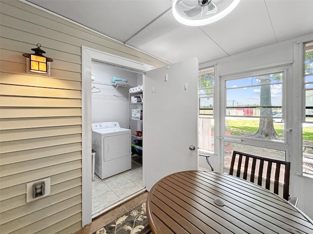 7508 Hollowell Dr, Tampa, FL 33615 - dining area with wood finished floors and washer / dryer