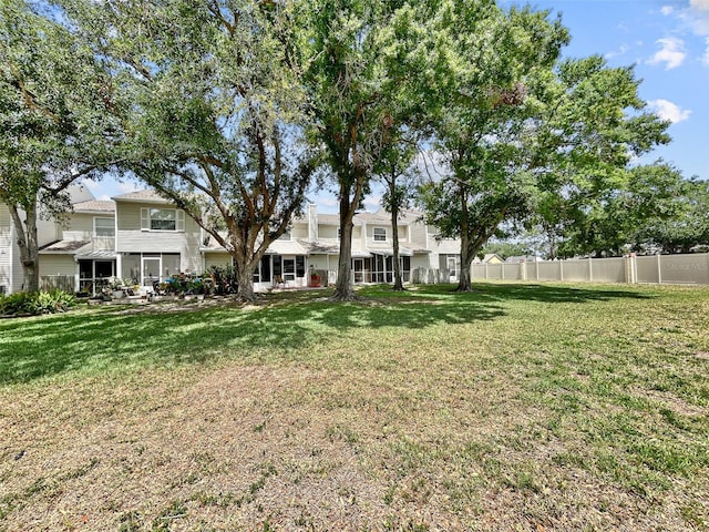 7508 Hollowell Dr, Tampa, FL 33615 - view of yard featuring a patio area and fence