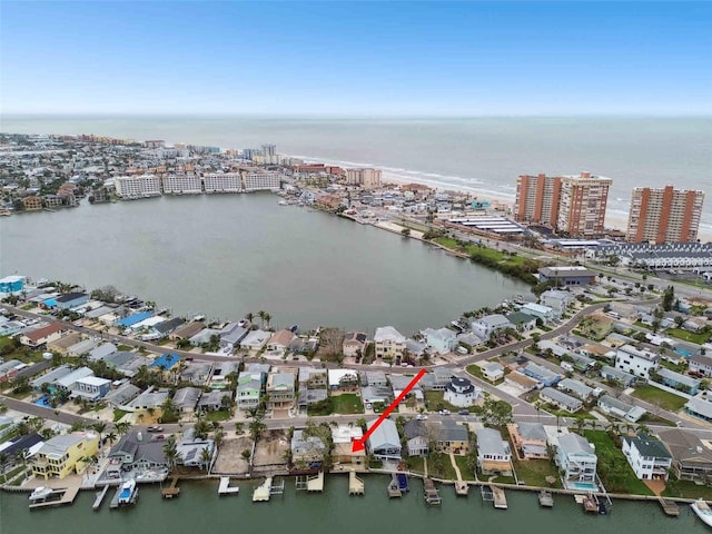 aerial view featuring a water view and a view of city