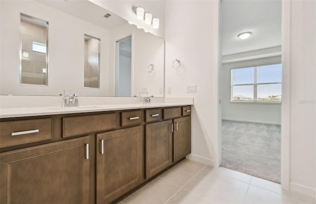 10317 Cross River Trl, Parrish, FL 34219 - full bathroom featuring double vanity and tile patterned floors