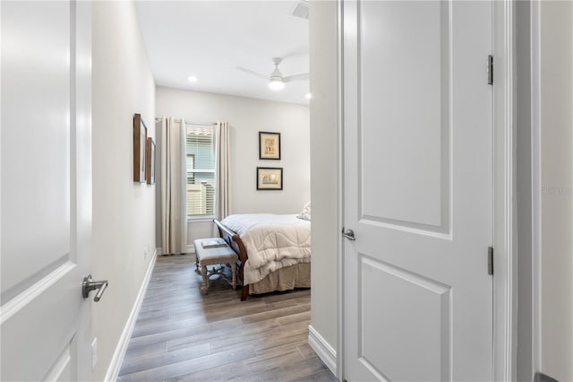 4365 Frontera Ln, Wesley Chapel, FL 33543 - hall with baseboards, wood finished floors, and recessed lighting