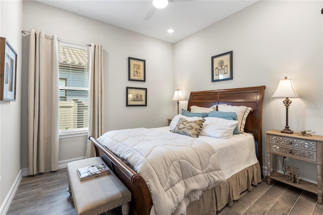 4365 Frontera Ln, Wesley Chapel, FL 33543 - bedroom with a ceiling fan, baseboards, multiple windows, and wood finished floors