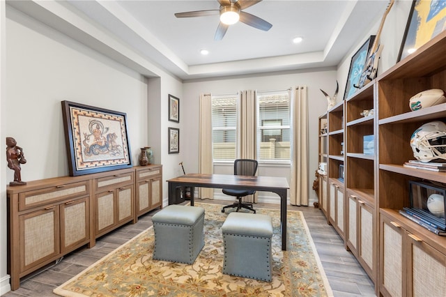 4365 Frontera Ln, Wesley Chapel, FL 33543 - office with a ceiling fan, light wood-style floors, a raised ceiling, baseboards, and recessed lighting