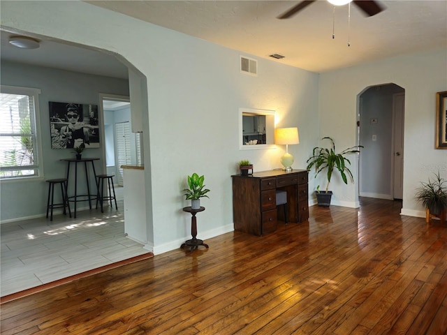 3545 7th Ave N, Saint Petersburg, FL 33713 - interior space with visible vents, baseboards, a ceiling fan, and hardwood / wood-style flooring