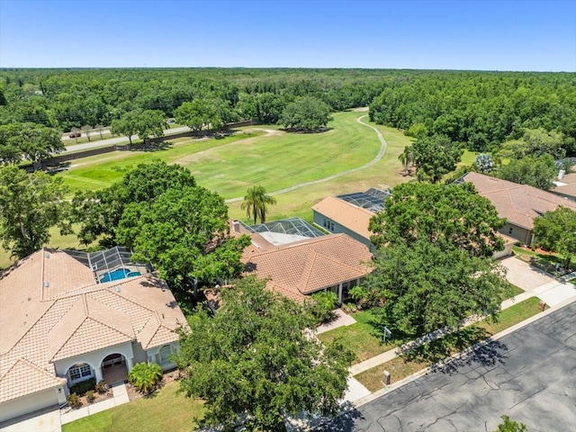 1084 Berkshire Ln, Tarpon Springs, FL 34688 - drone / aerial view of a forest and a local golf course