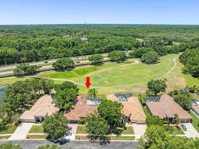 1084 Berkshire Ln, Tarpon Springs, FL 34688 - bird's eye view of a forest and a golf course
