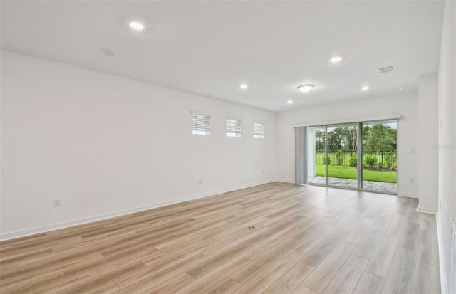10414 Cross River Trl, Parrish, FL 34219 - empty room featuring light wood-type flooring and recessed lighting