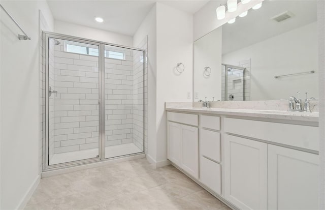10414 Cross River Trl, Parrish, FL 34219 - full bathroom featuring a stall shower, double vanity, and tile patterned flooring