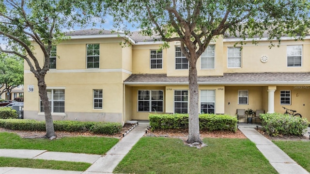 10906 Keys Gate Dr, Riverview, FL 33579 - townhome / multi-family property featuring stucco siding and a front lawn