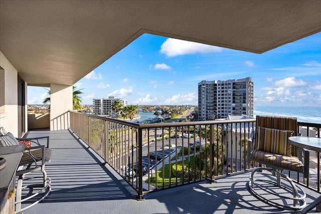 balcony featuring a water view